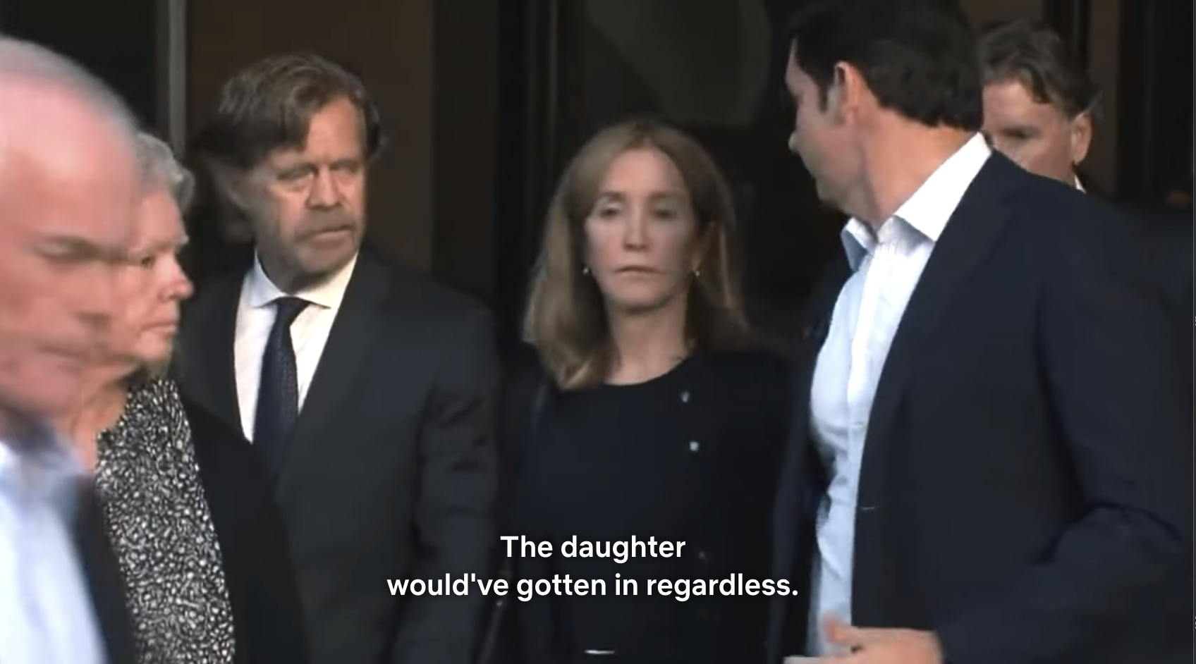 Felicity Huffman and William H. Macy leaving the courtroom