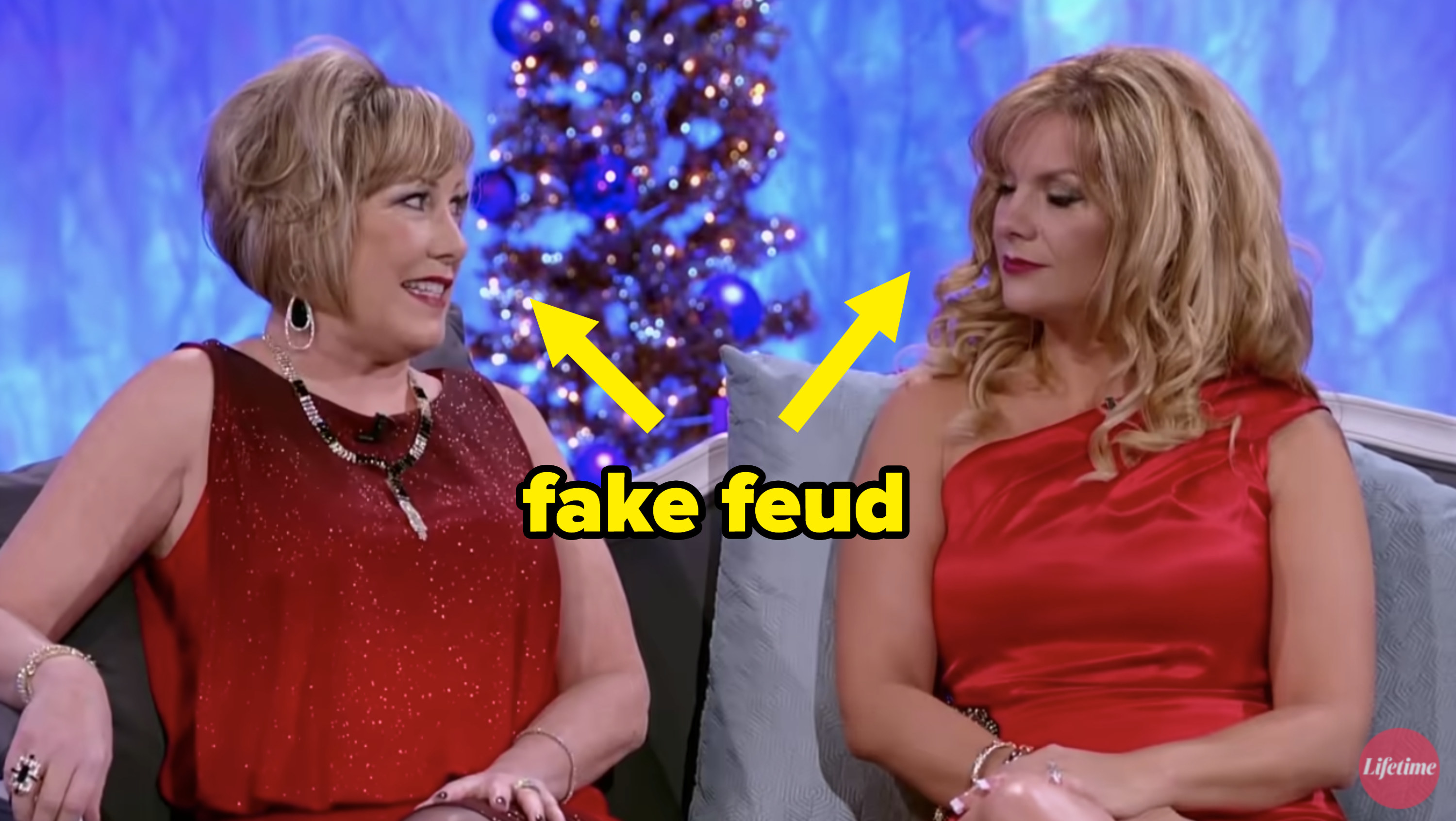 cathy and another one of the mom&#x27;s insulting each other with the text &quot;fake feud&quot;