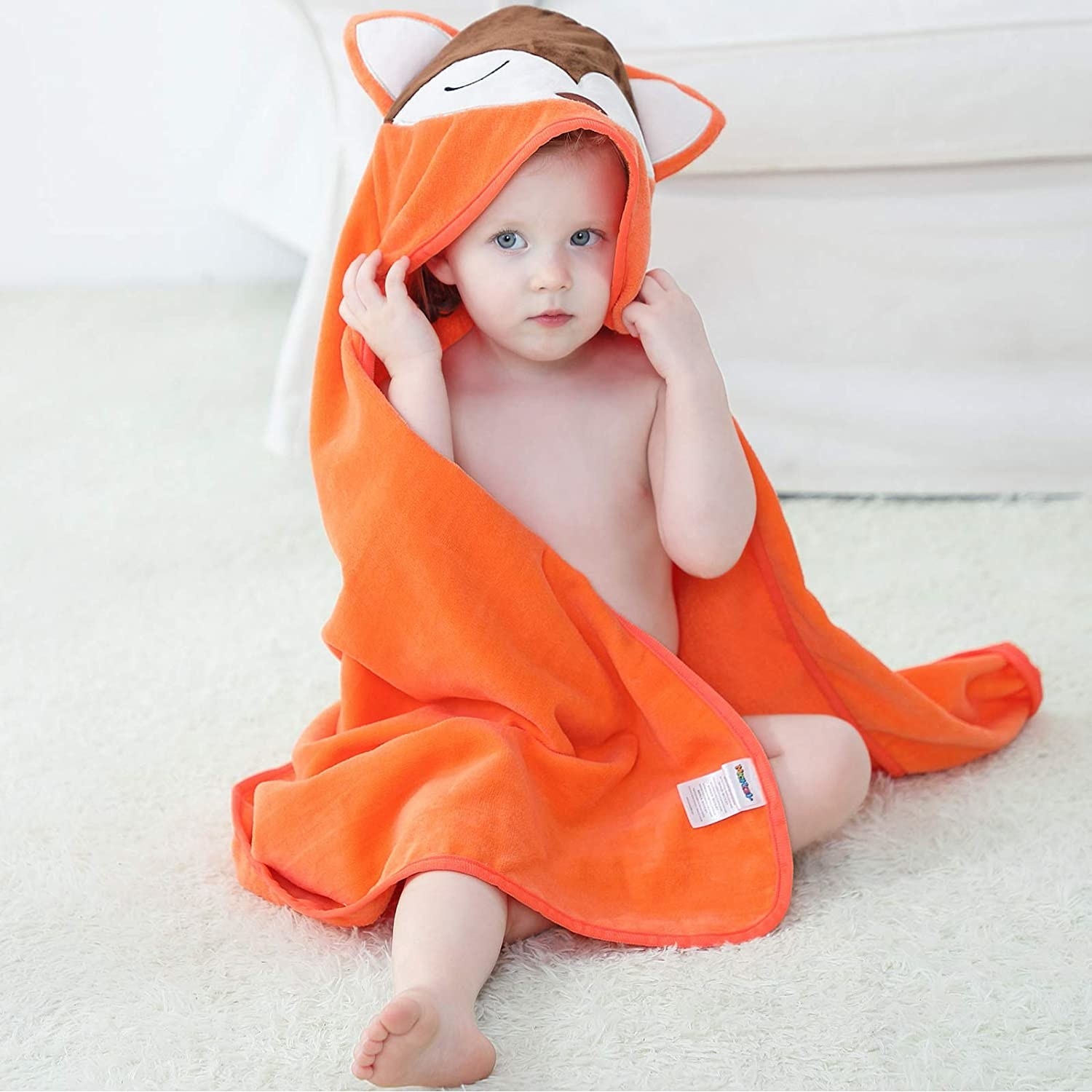 A baby in the fox towel