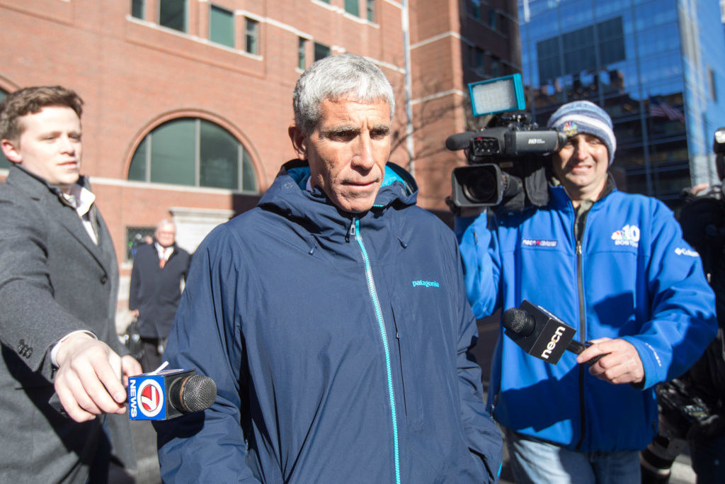 Rick Singer leaves Boston Federal Court after being charged with racketeering conspiracy