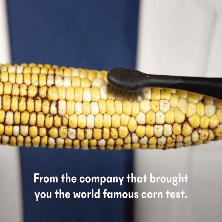 a picture of dirty piece of corn with a Burst toothbrush brushing it and leaving behind clean kernels with text that reads "From the company that brought you the world famous corn test" 