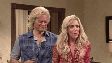 Bill Hader breaking character and Kristen Wiig trying not to laugh on SNL