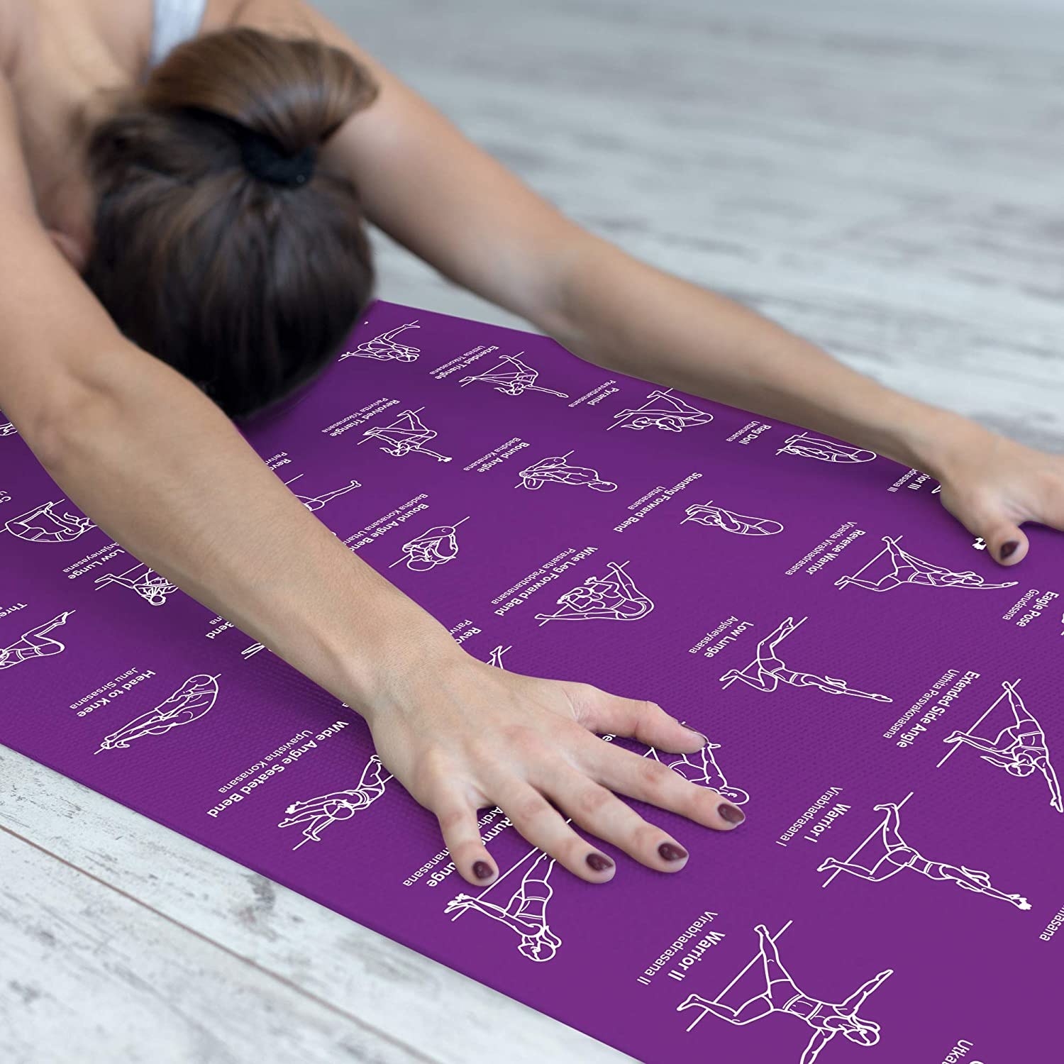 A person doing a child&#x27;s pose on the mat