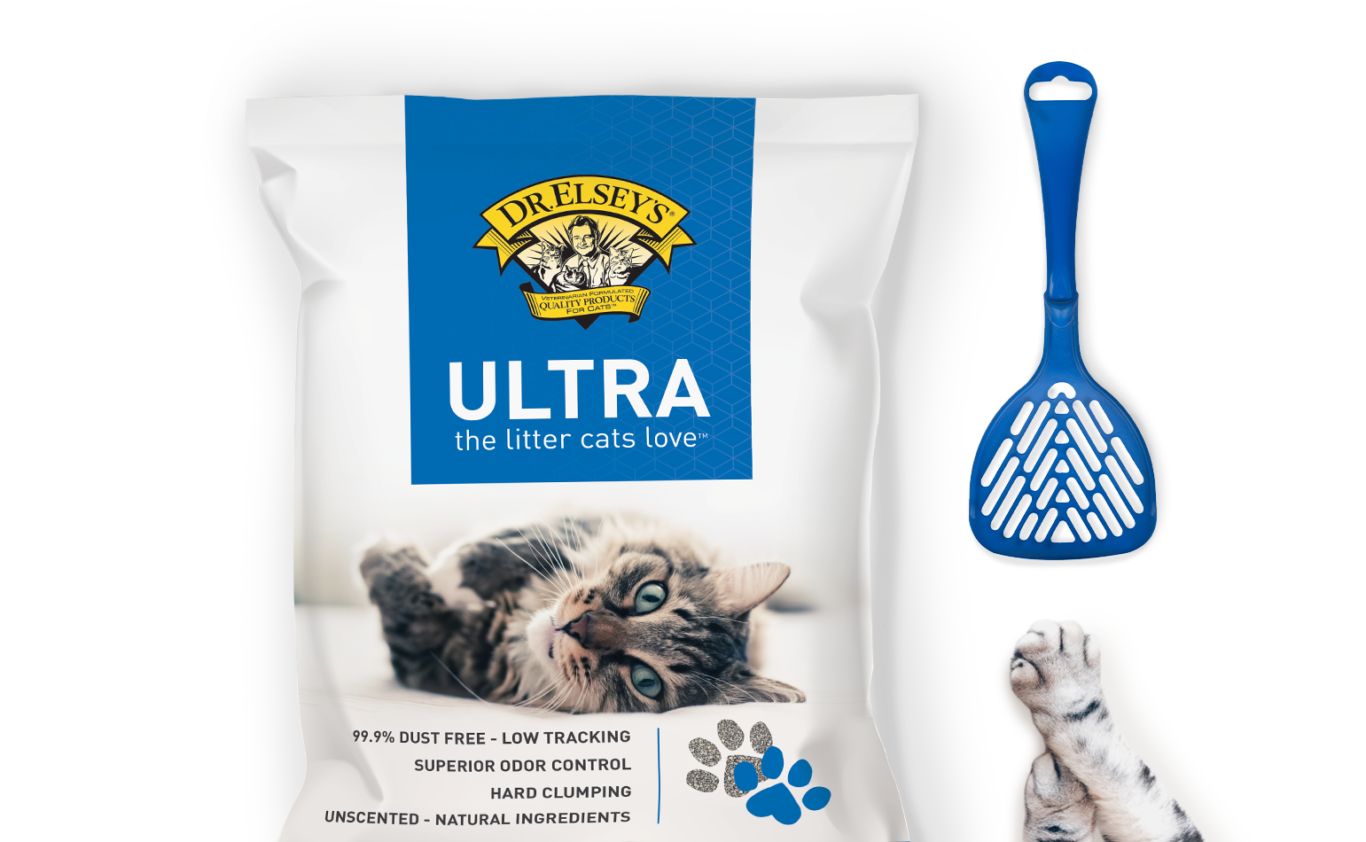 the bag of litter, a litter scooper, and a cat&#x27;s paw