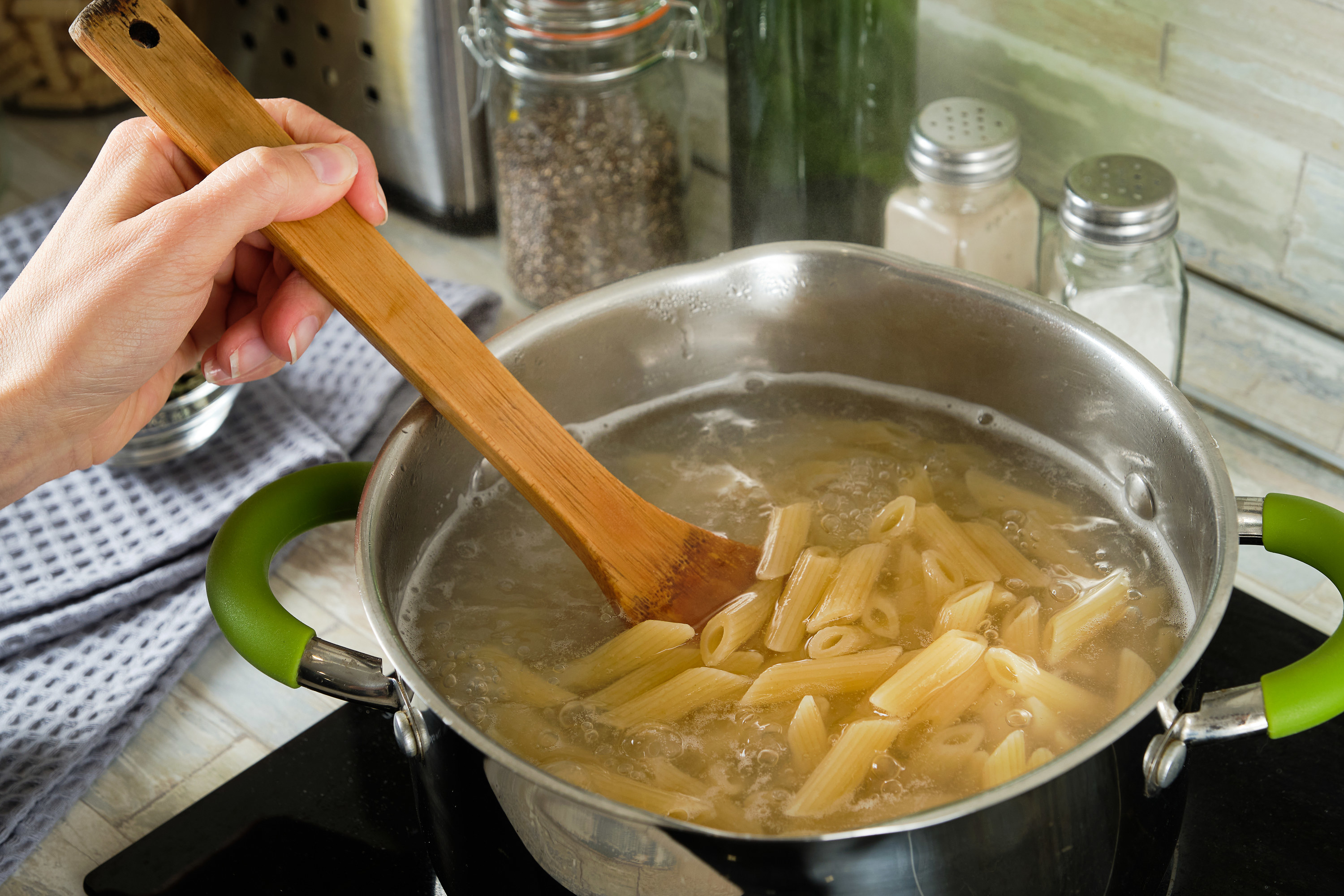 Stirring a pot of pasta
