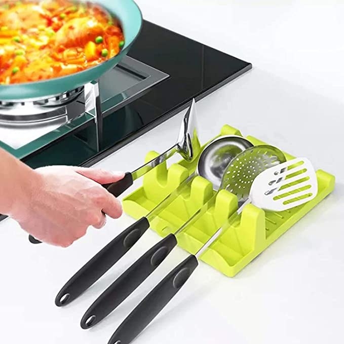 Green plastic utensils rack.