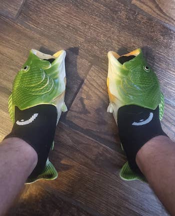 reviewer wearing fish flip flops 