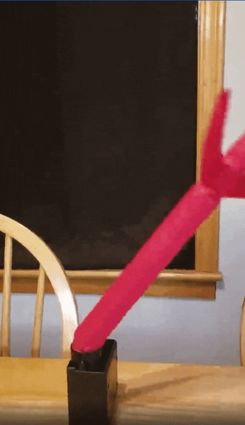 gif of reviewer video of the red inflatable man moving 