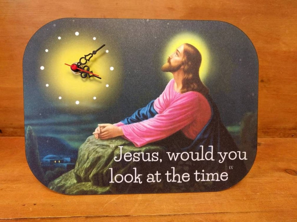 clock that says jesus look at the time with a picture of jesus looking at the clock 
