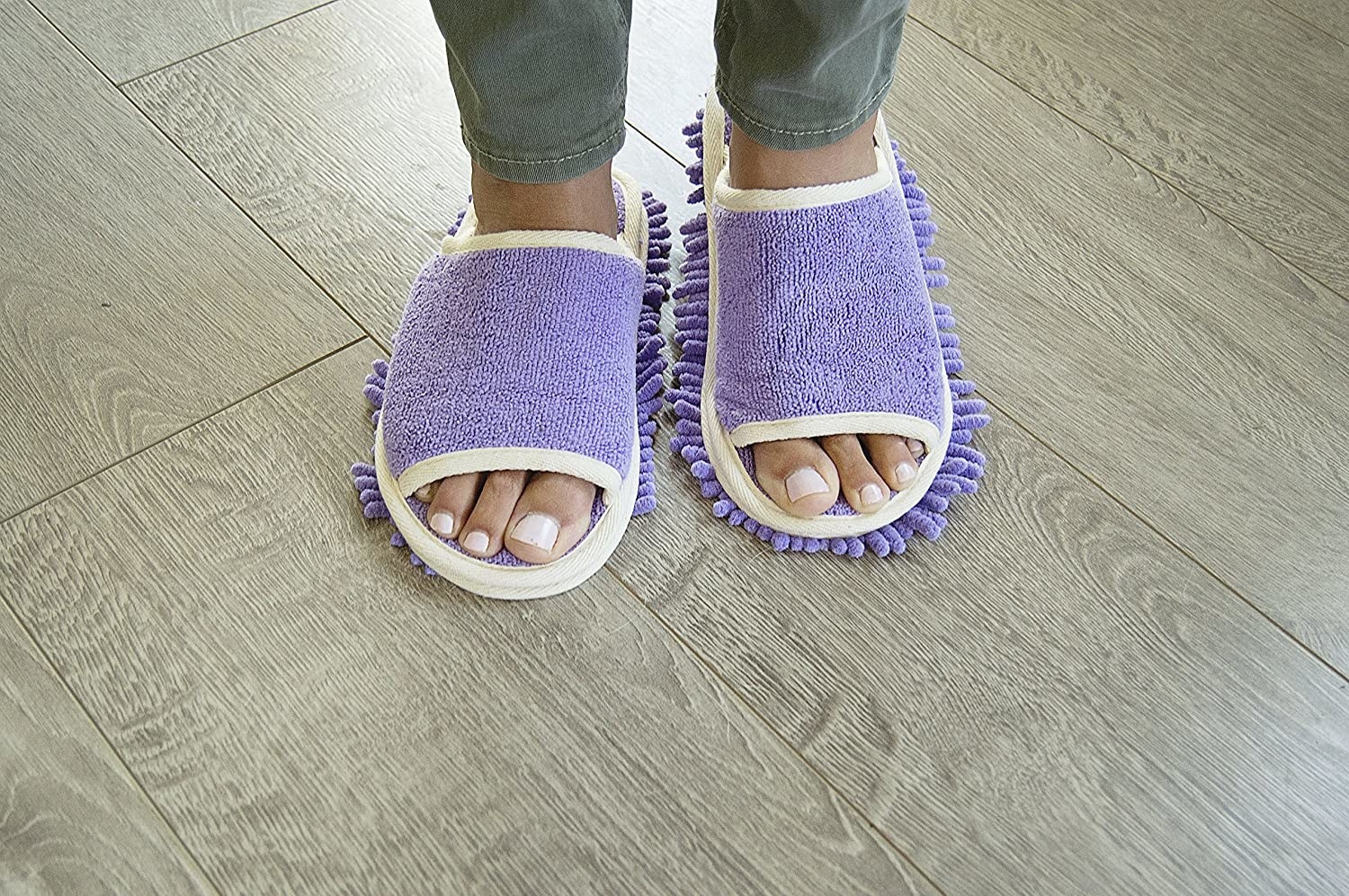 A person wearing the mop slippers 