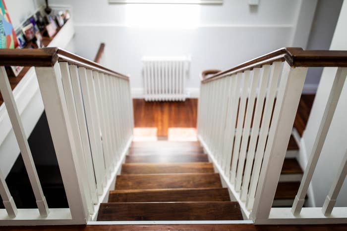 View from the top of a staircase to the bottom.