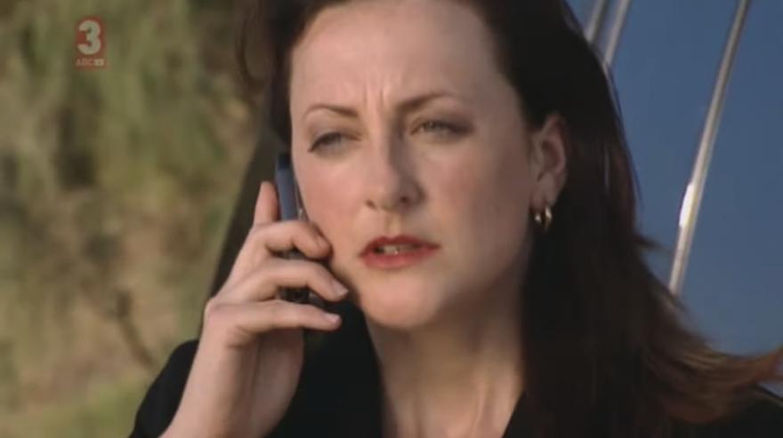 A close up of Helen Stanich while she&#x27;s talking on the phone