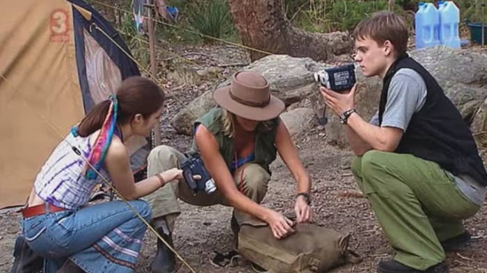 Characters from Jeopardy camping in the bush