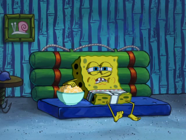 Screenshot of SpongeBob watching TV in his underwear while eating popcorn