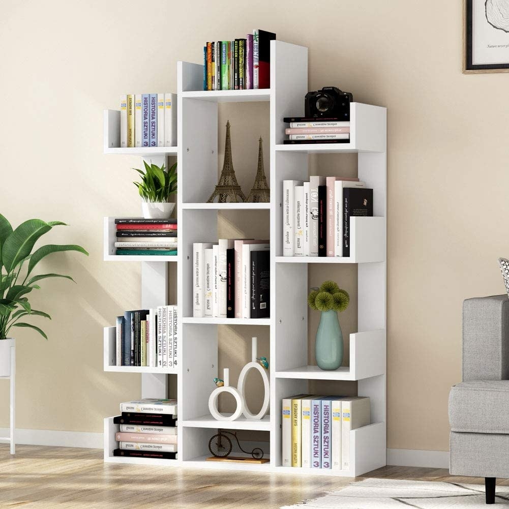 white asymmetric bookcase with lots of rectangular compartments