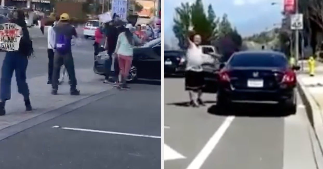 Man driving a car in a crowd against Asian violence near Los Angeles