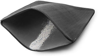 the black mat opened to show collected litter