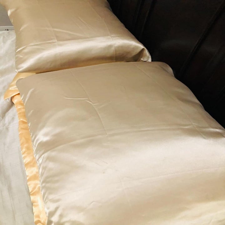satin pillow cases on a bed