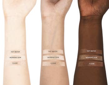 the three shades of highlighter swatched on three different skin tones