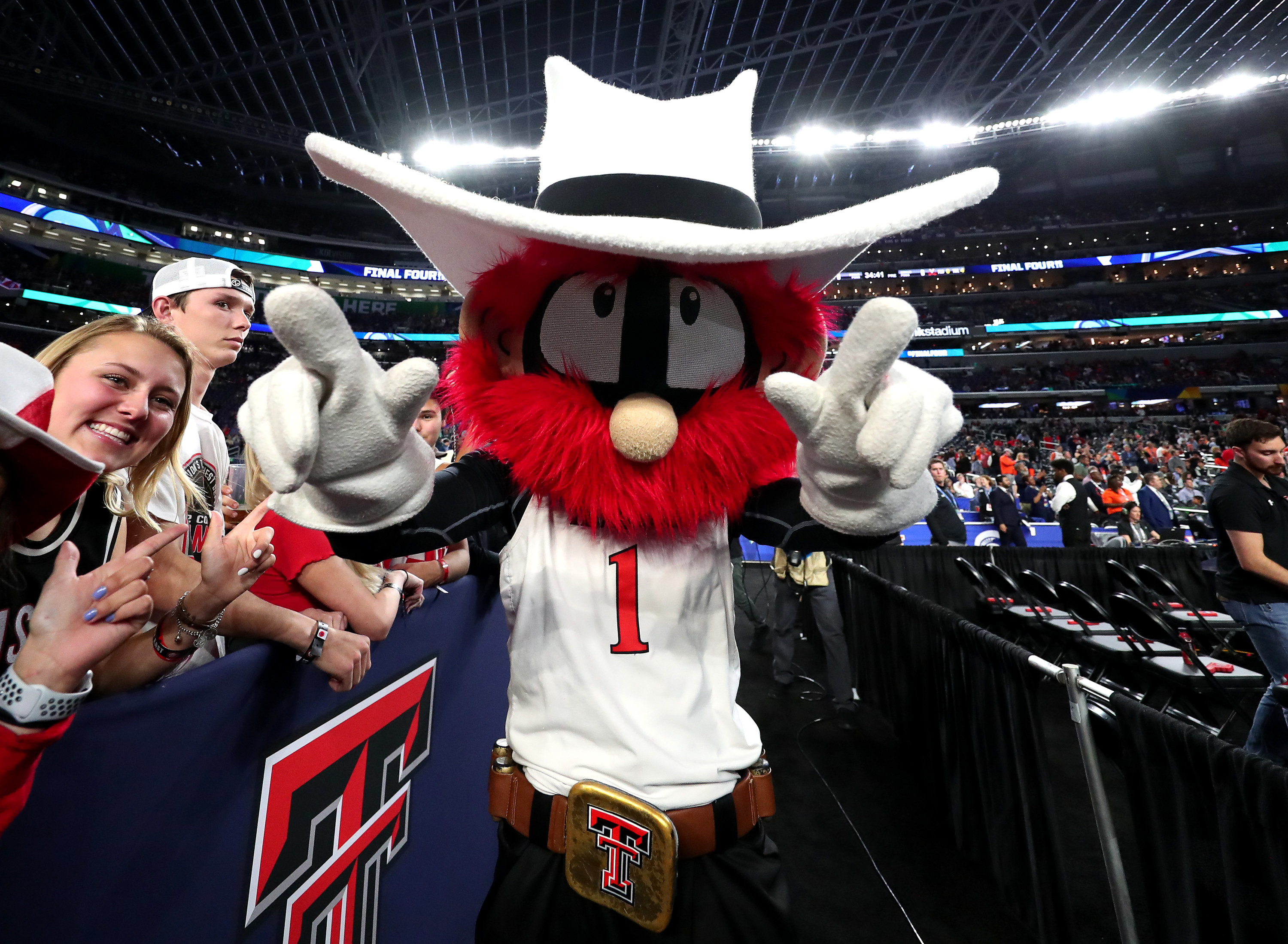 Cowboy hat–wearing mascot with a big red mustache.