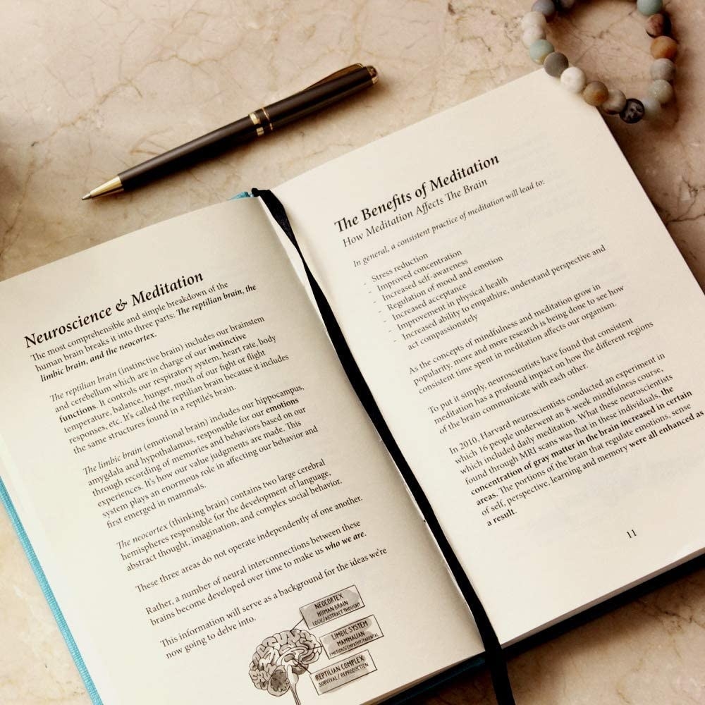 the book open on a page that says neuroscience and meditation and the benefits of meditation