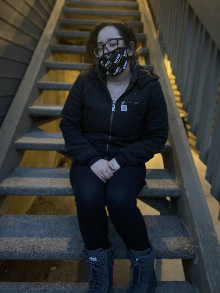 woman sitting on steps