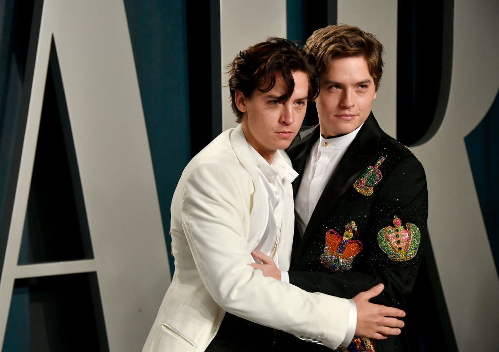 Cole Sprouse (L) and Dylan Sprouse attend the 2020 Vanity Fair Oscar Party