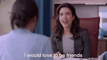 A woman saying &quot;I would love to be friends&quot; in an office