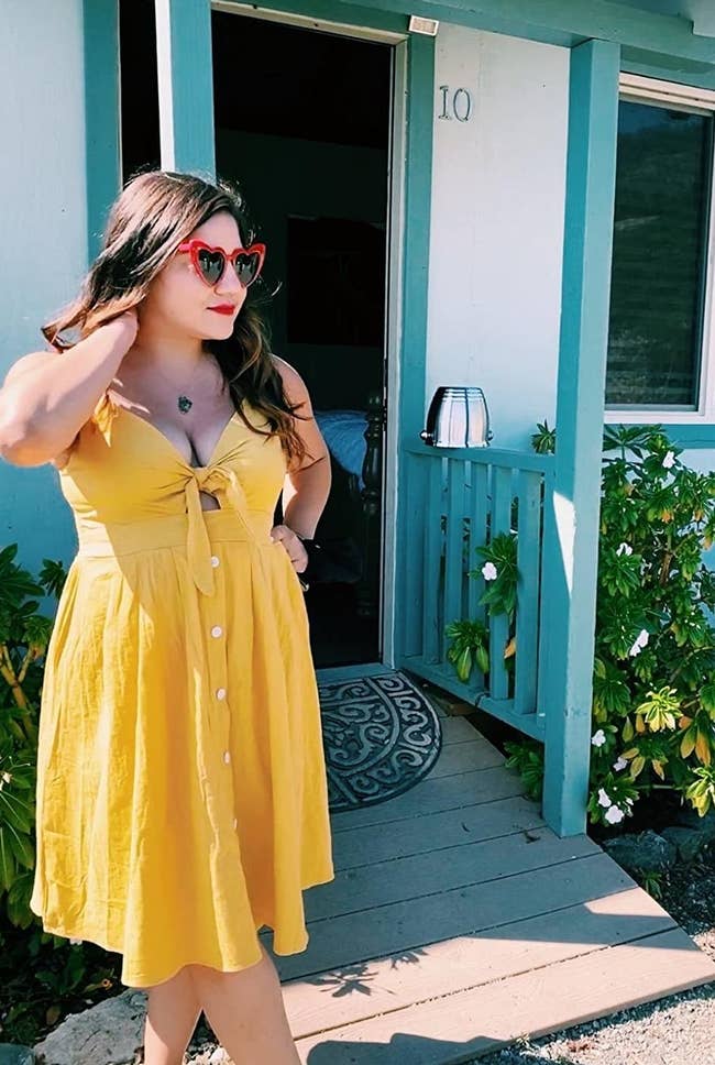 Reviewer wearing the yellow dress