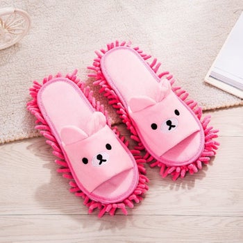 Pair of pink bear-shaped slippers