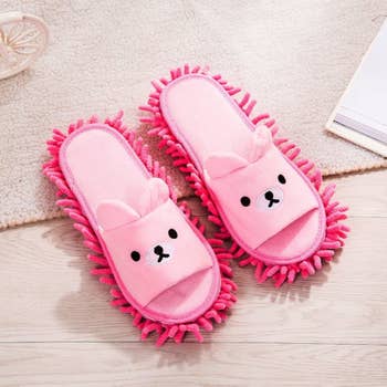 Pair of pink bear-shaped slippers