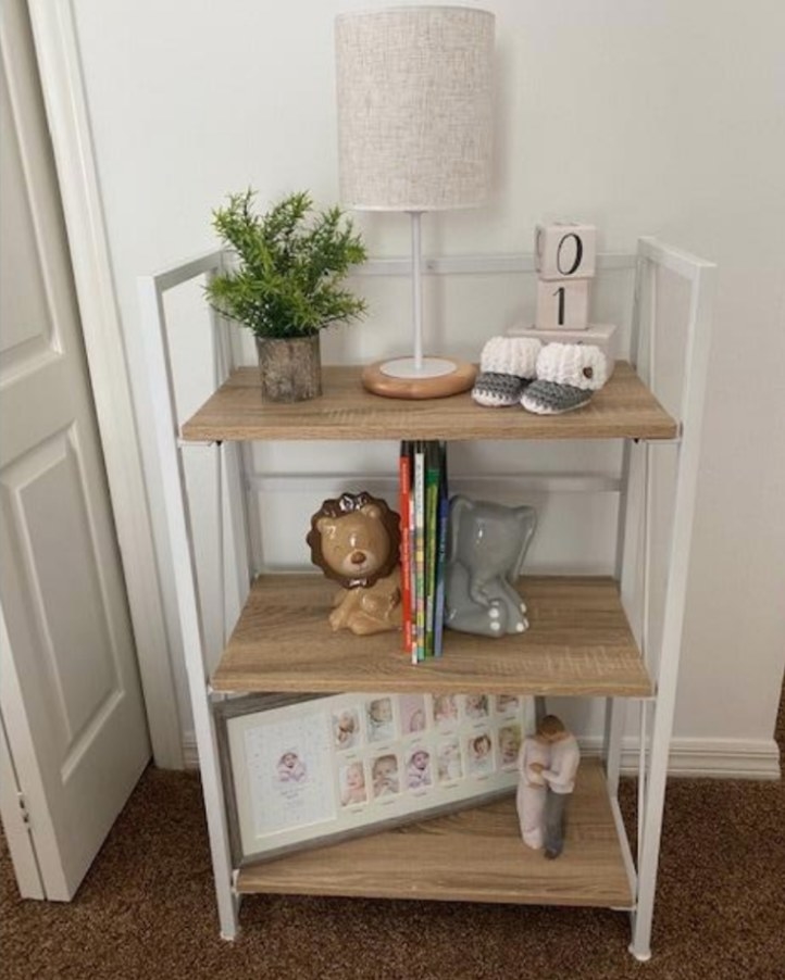 white and light wood bookcase in a reviewer&#x27;s home