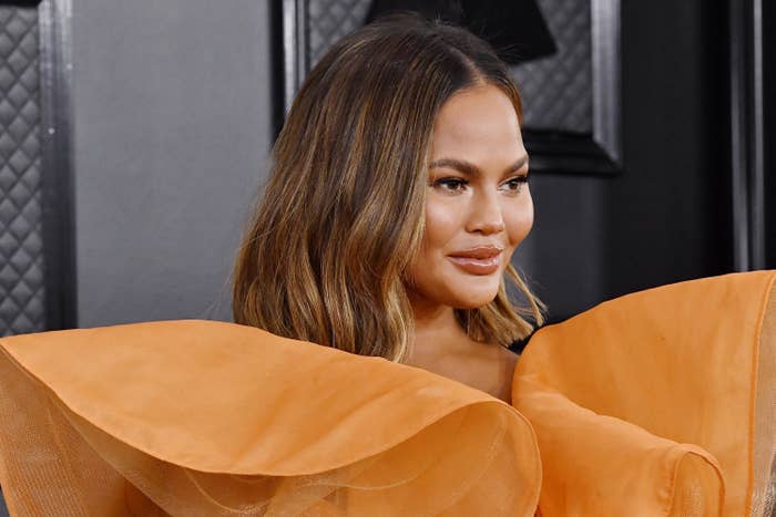 Chrissy Teigen on the red carpet at the Grammy Awards in 2020