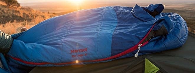 The sleeping bag in the light of a rising sun