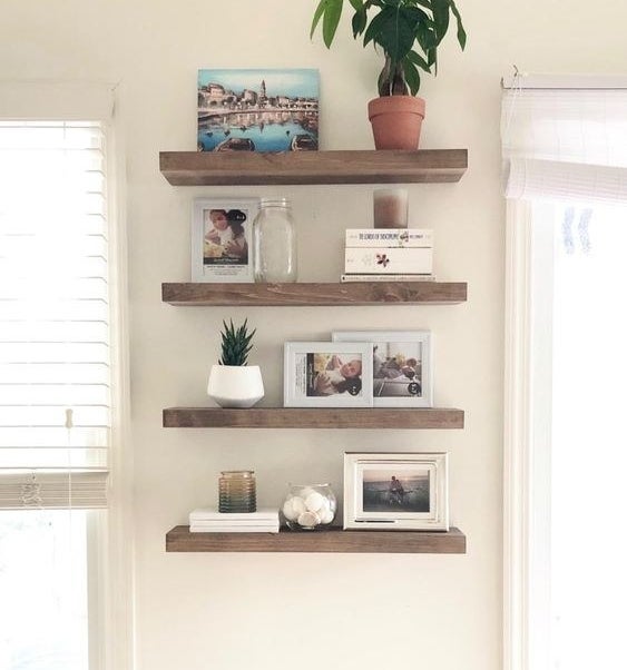 Reviewer&#x27;s picture of the wooden wall shelves 