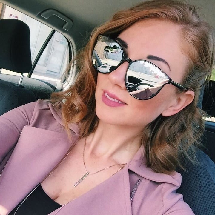 Another reviewer wearing the reflective style