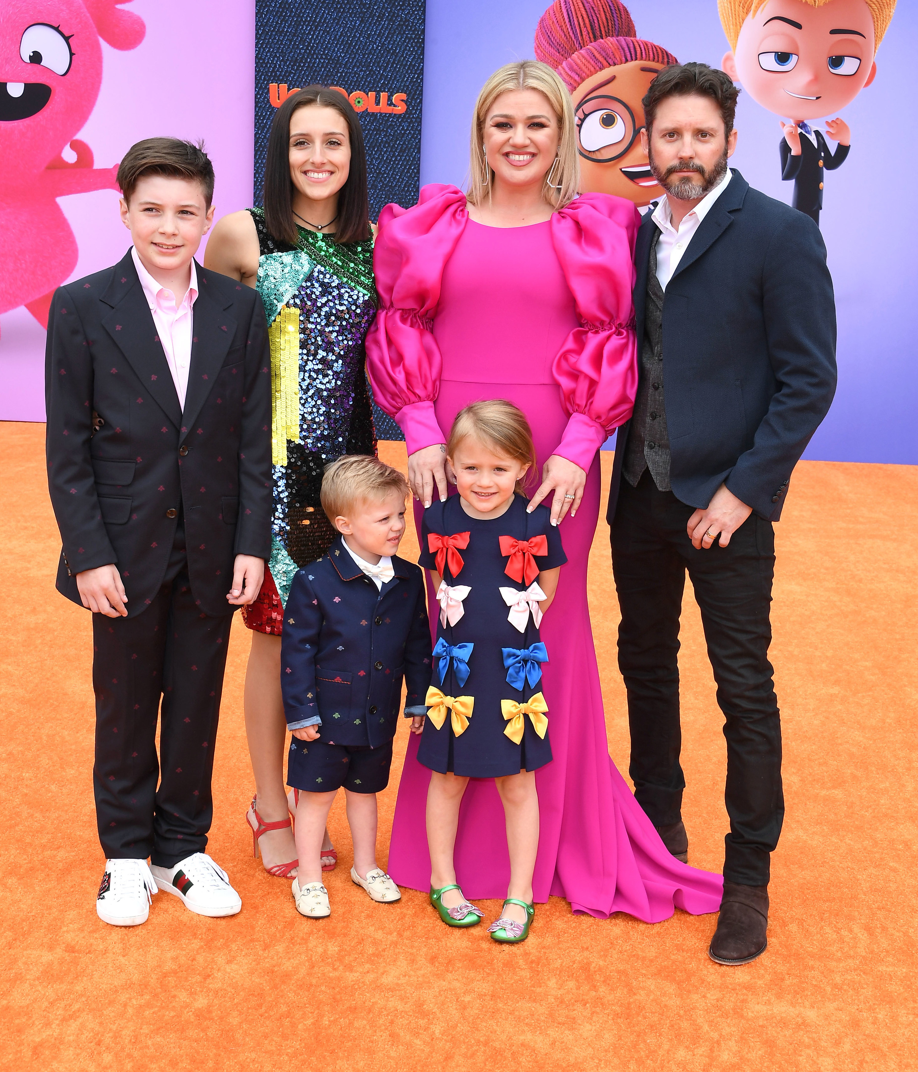 Clarkson with ex-husband Brandon Blackstock and their children at a press event