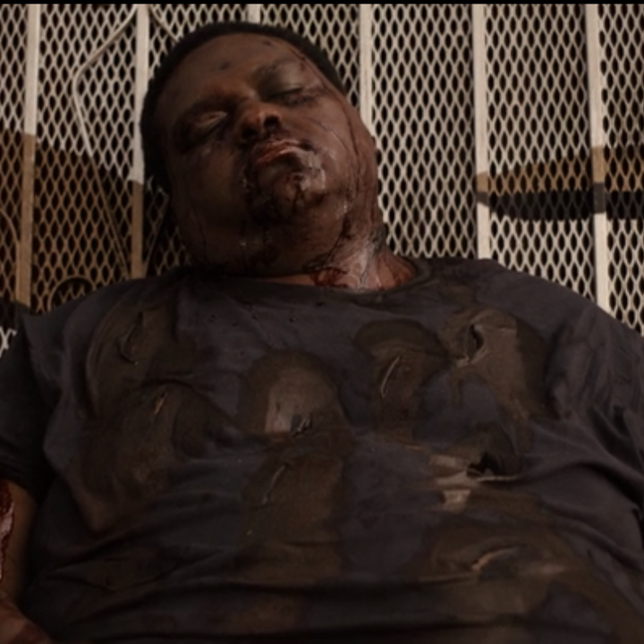 Fatback lies dead on the sidewalk