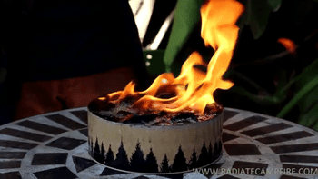 Gif showing how to put out the campfire with the lid