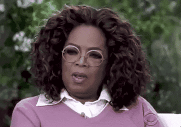 Oprah blinks with her mouth open in surprise and says &quot;what?&quot;