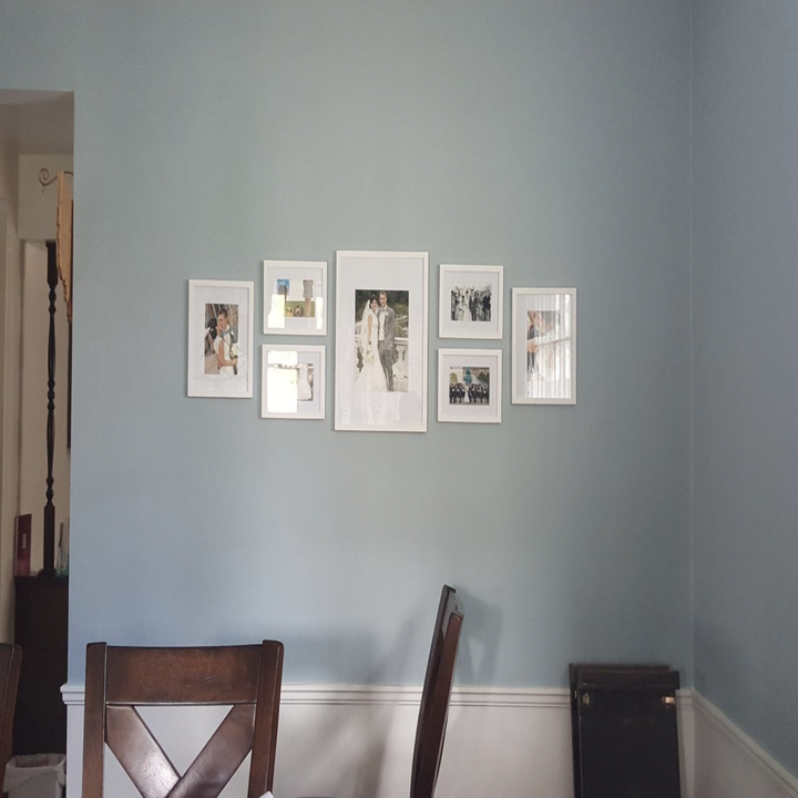 A customer review photo of the frames perfectly placed on their wall