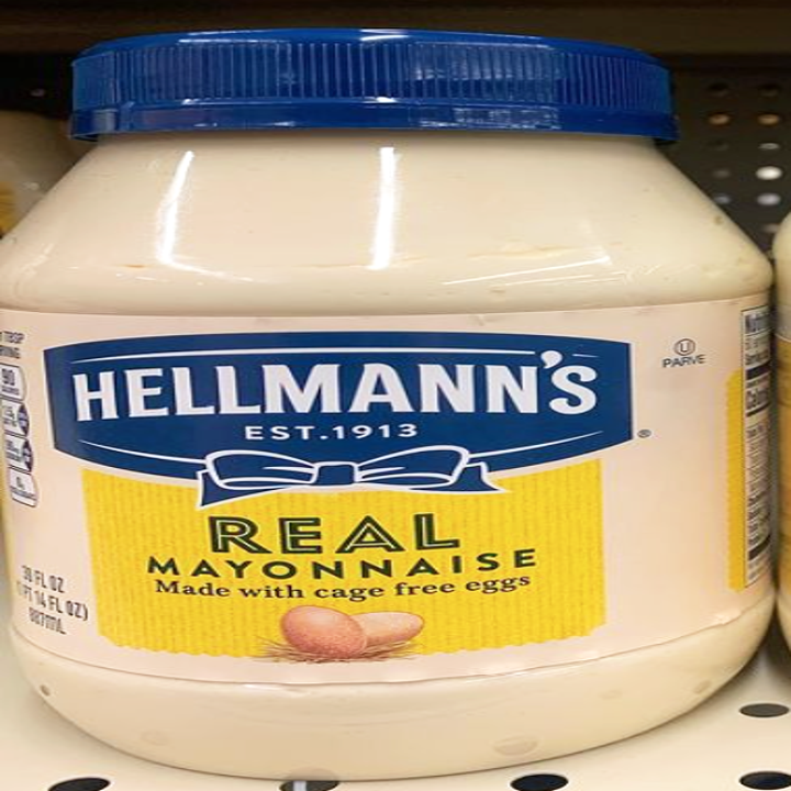A jar of Hellmann's mayo with blue and yellow coloring, a blue bow and "real mayonnaise" written on it