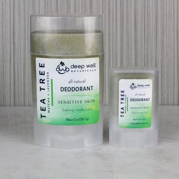A large and small stick of Deep Well Botanicals natural deodorant