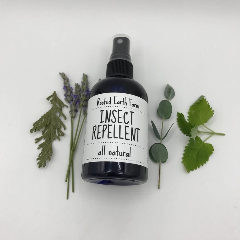 Bottle of Rooted Earth Farm all natural insect repellent 