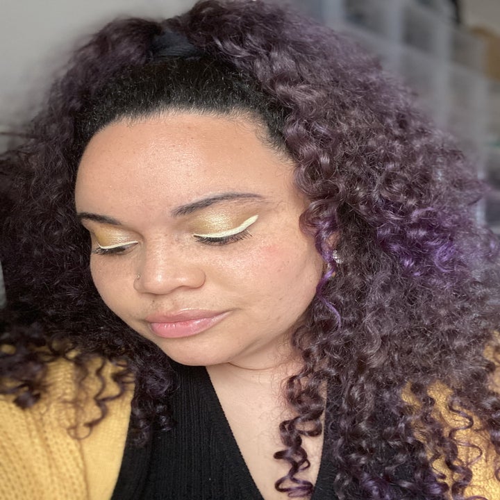 buzzfeed editor wearing the pale yellow eyeliner 