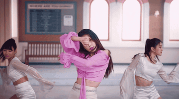IU dances in the music video for Lilac