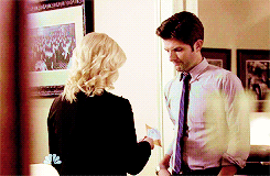 Ben planting a big romantic kiss on Leslie