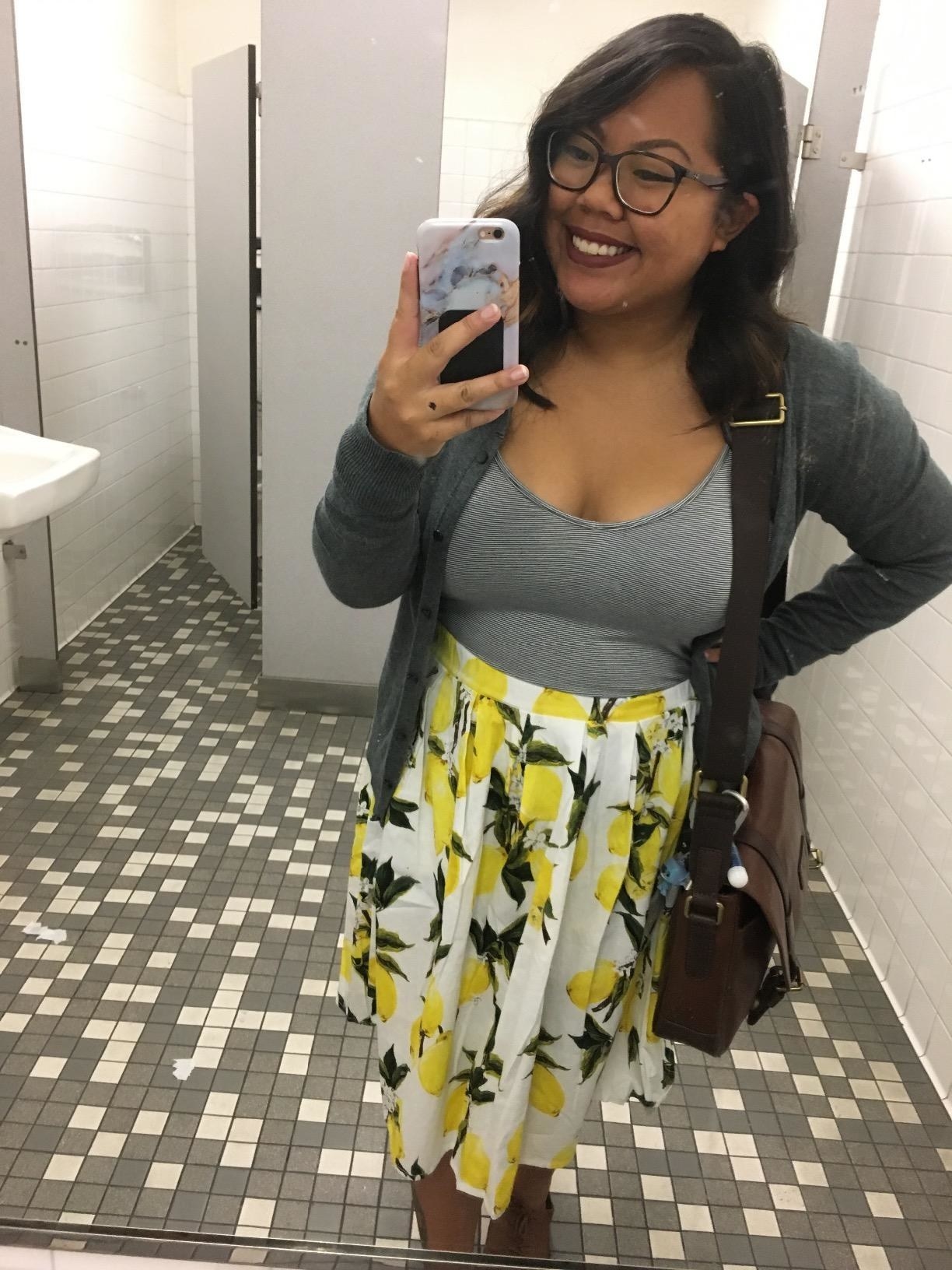 Reviewer wearing the yellow lemon skirt