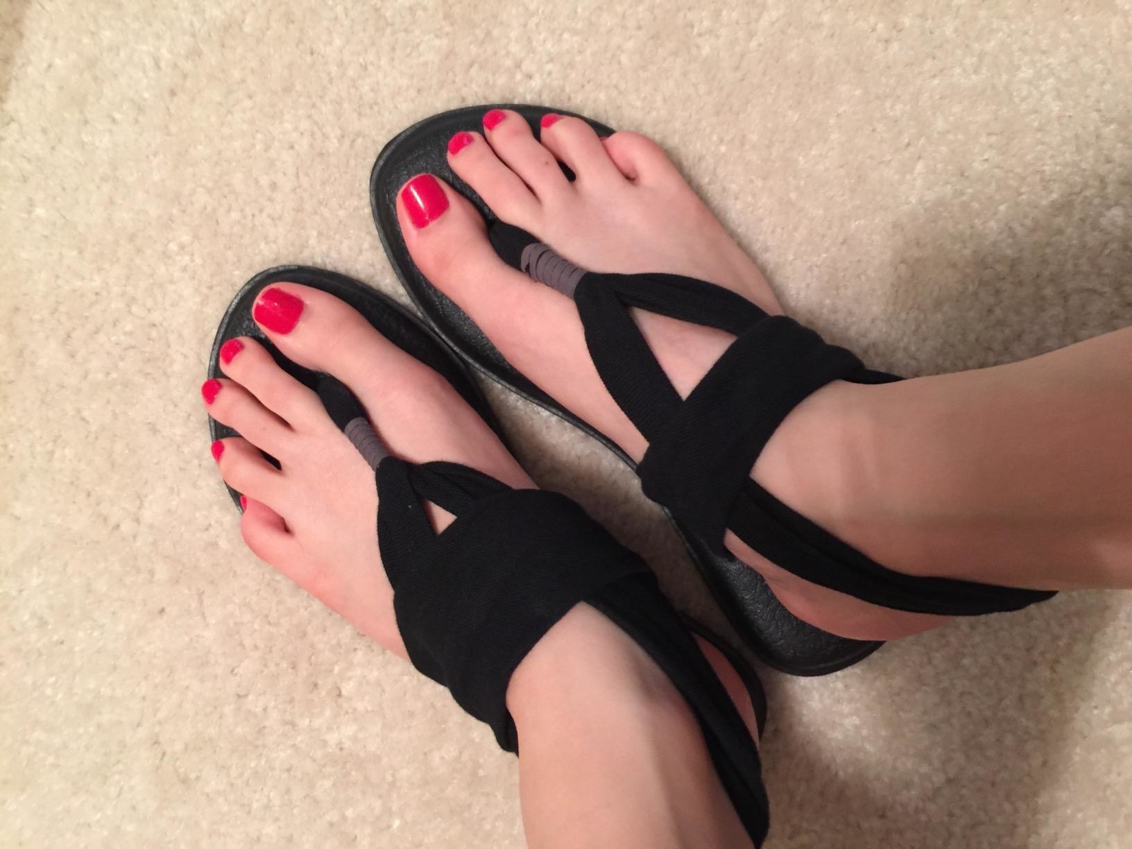 Reviewer wearing the black yoga sling sandals