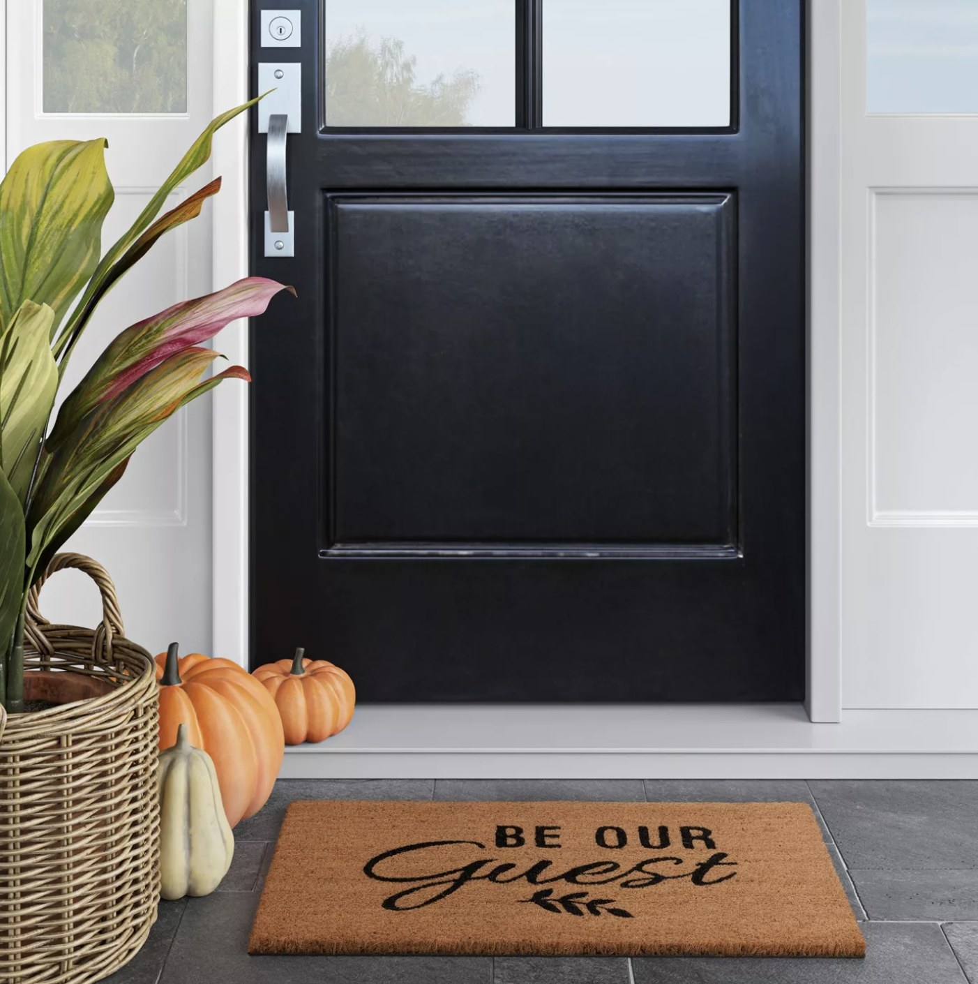 The doormat that says Be Our Guest